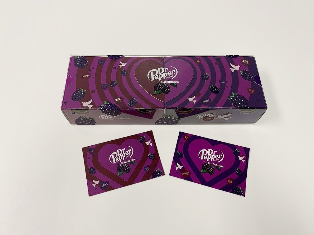 Dr Pepper Blackberry packaging and two cards featuring purple hearts and blackberry illustrations