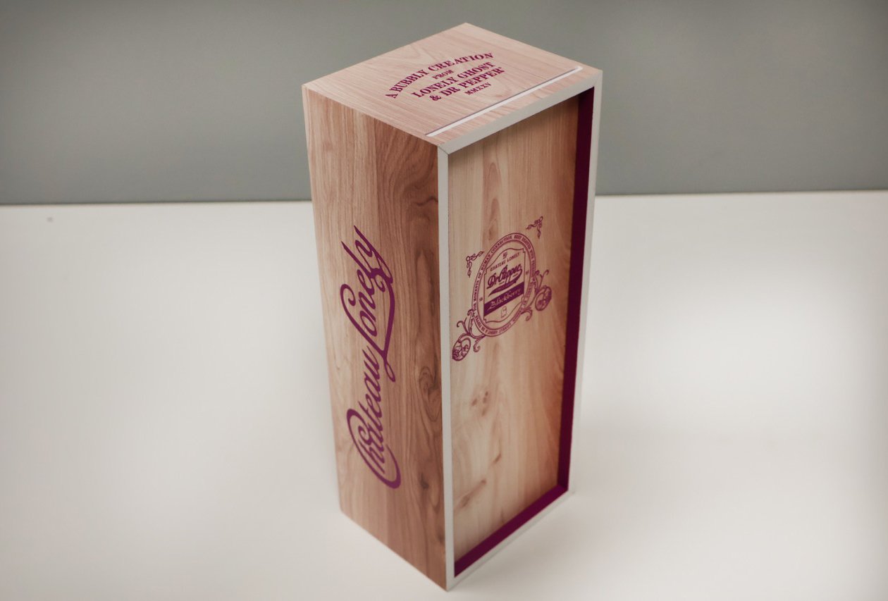 Closed Chateau Lonely influencer kit with printed woodgrain packaging and burgundy Dr Pepper and Chateau Lonely branding